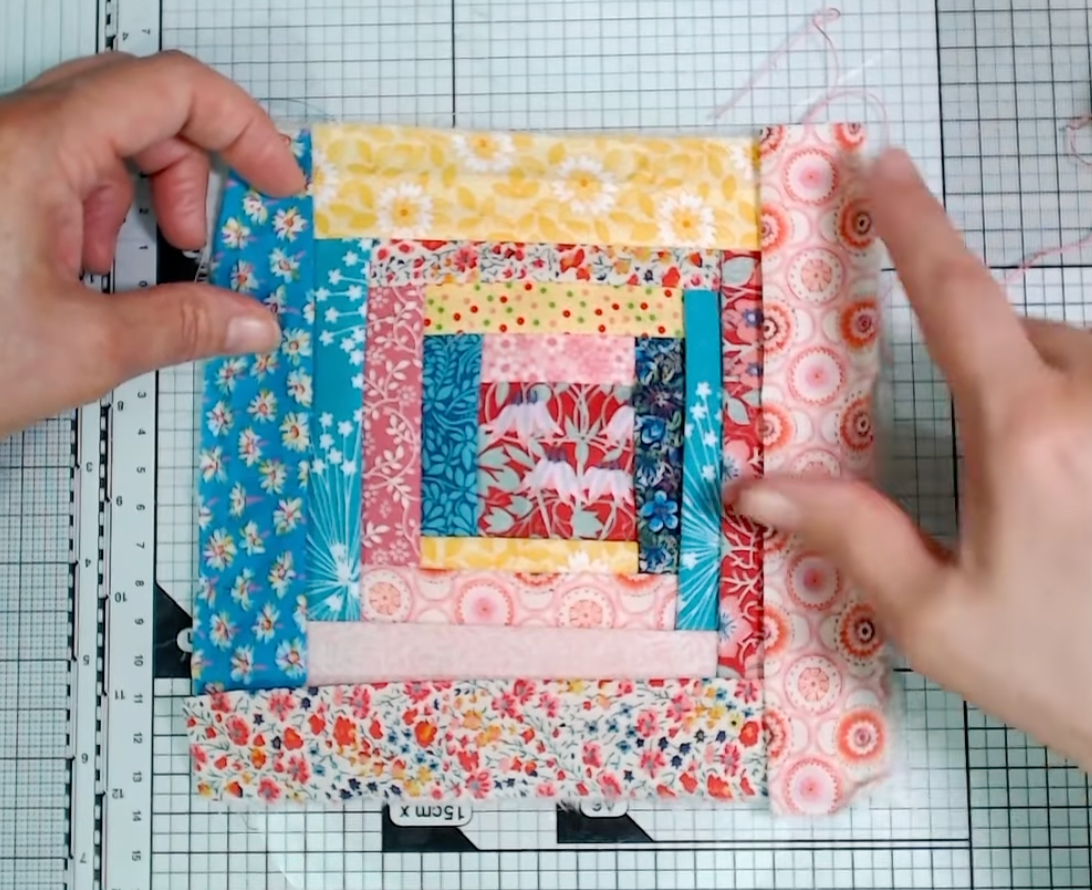 Photo taken from YouTube video of Annie completeing a Manx Quilt panel